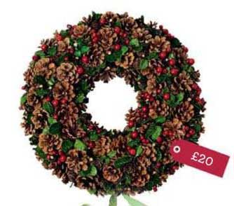 berry and pine cone wreath