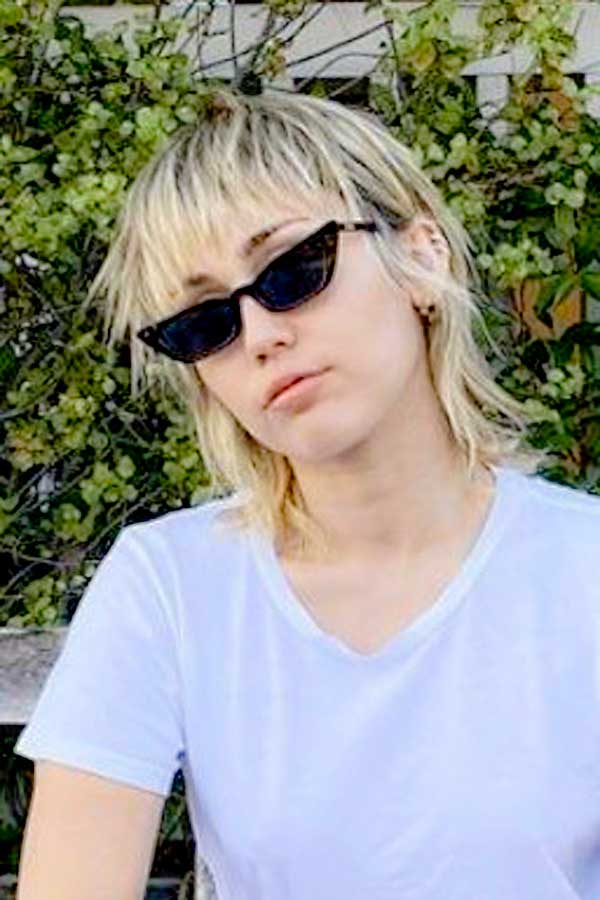 Miley Cyrus Cuts Bangs  Transforms Into Hannah Montana